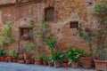 Traditional faÃÂ§ade of Italian house in the small magical and old village of Pienza, Val D`Orcia Tuscany Ã¢â¬â Italy Royalty Free Stock Photo